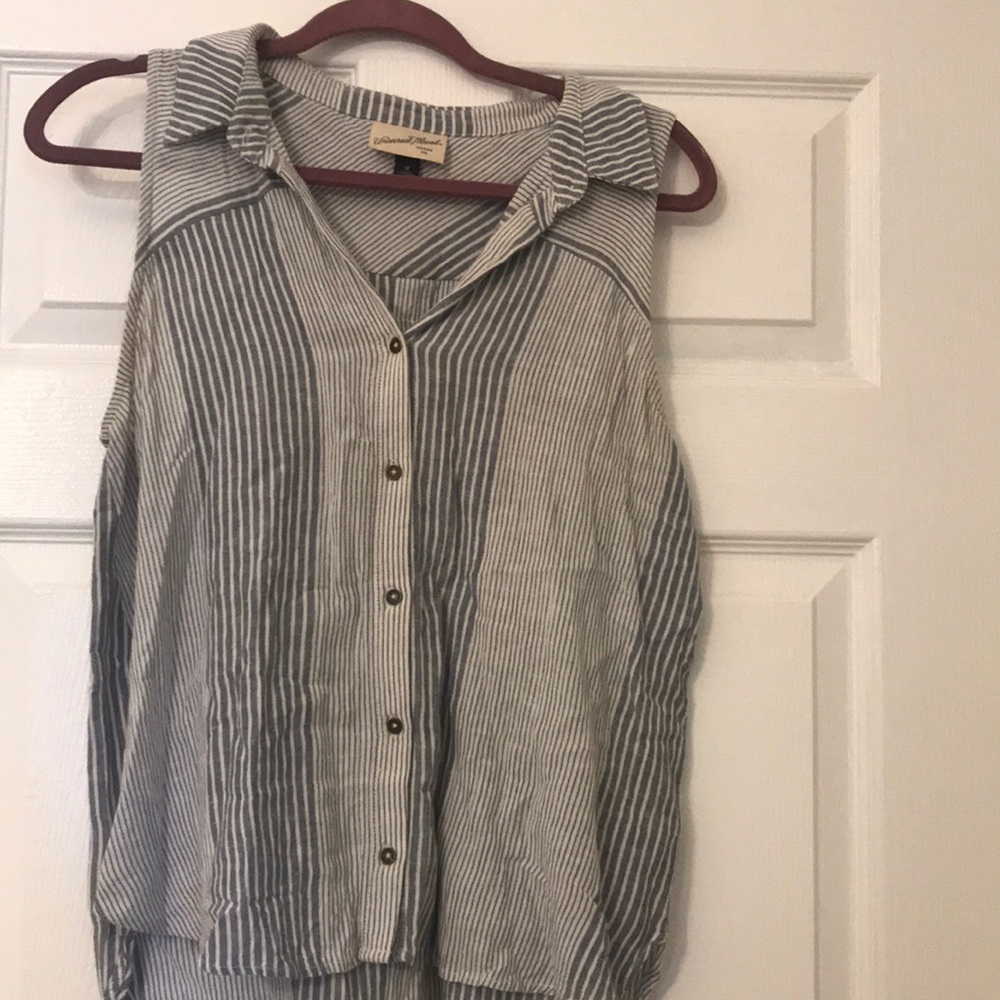 Blue and white striped button down collared shirt